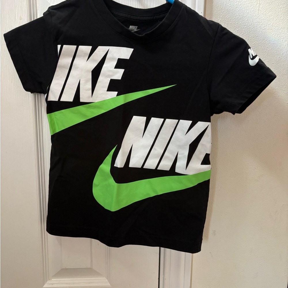 Nike Kids Black Tee with Vibrant Green Swoosh